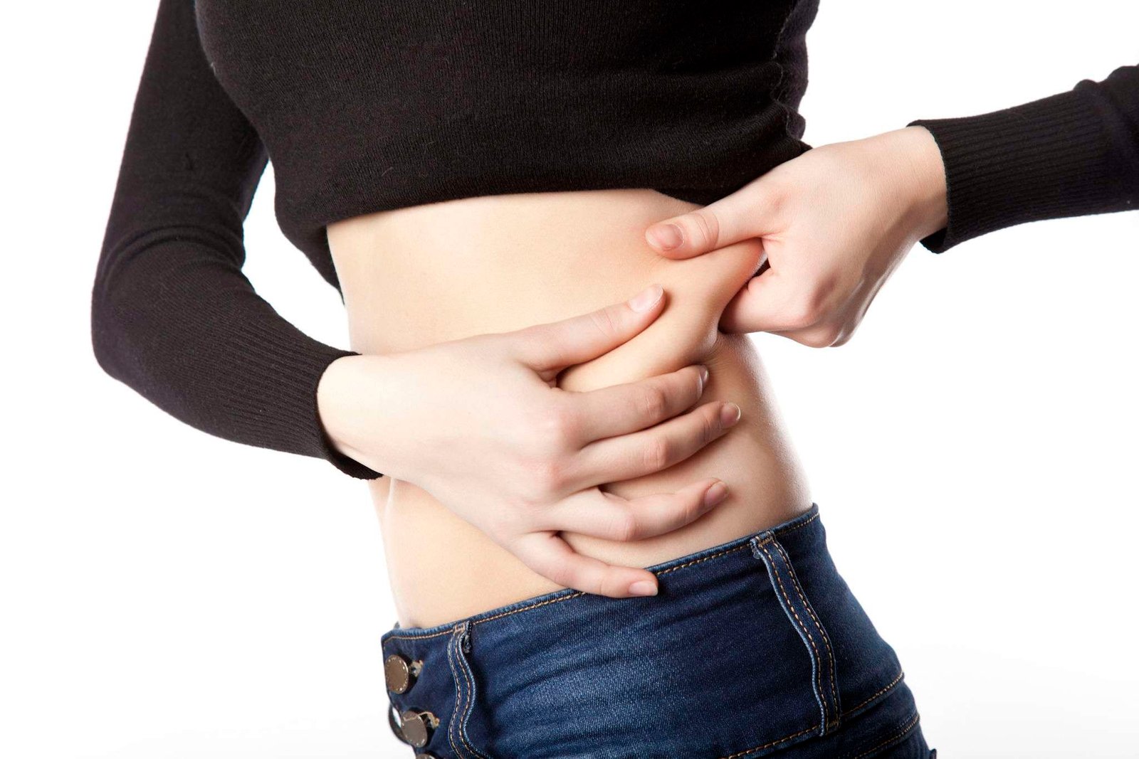 Slim woman is on a diet. Isolated on a white background